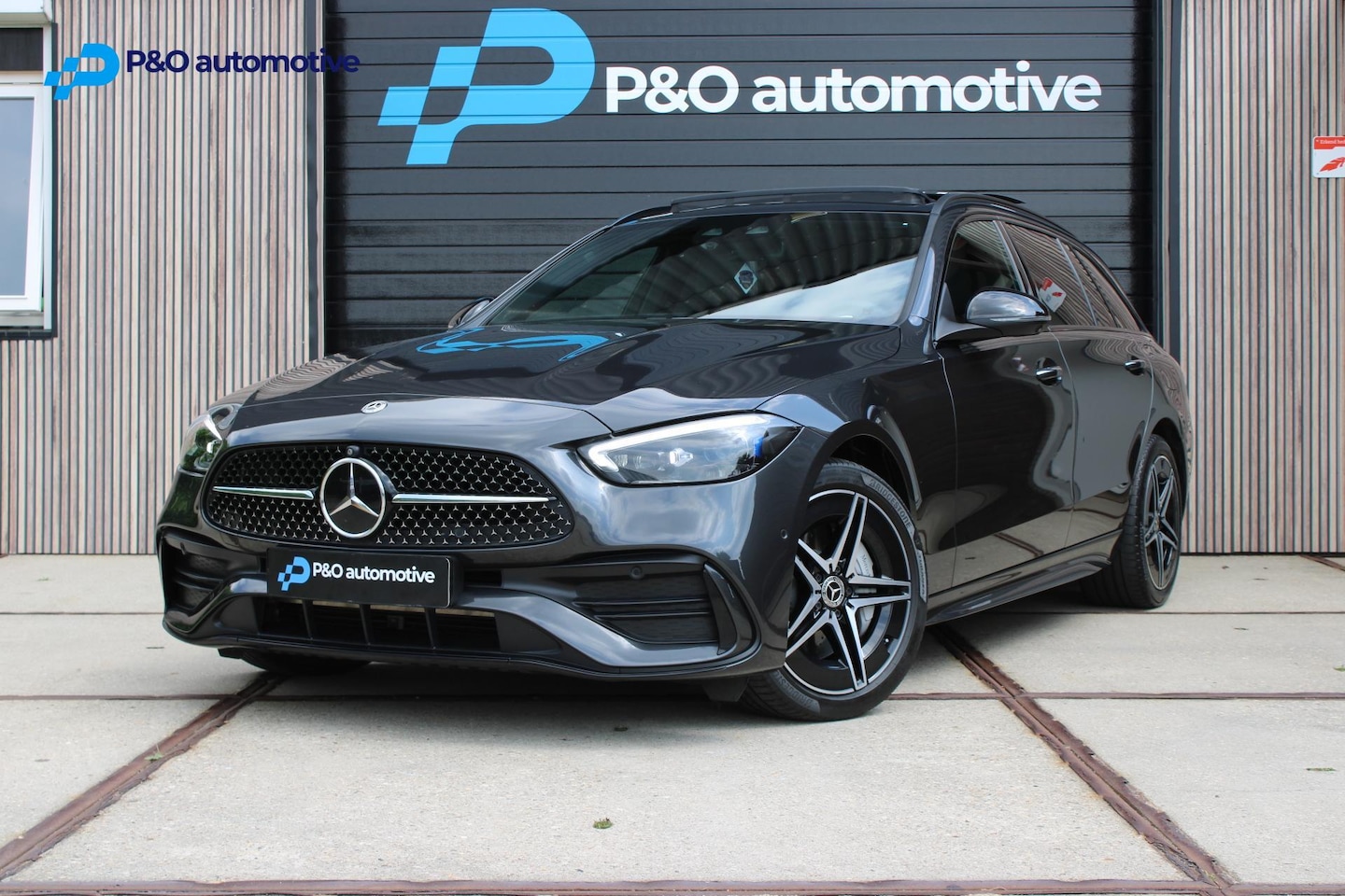 Mercedes-Benz C-klasse Estate - 300 e AMG Line PANO | HUD | MASSAGE - AutoWereld.nl