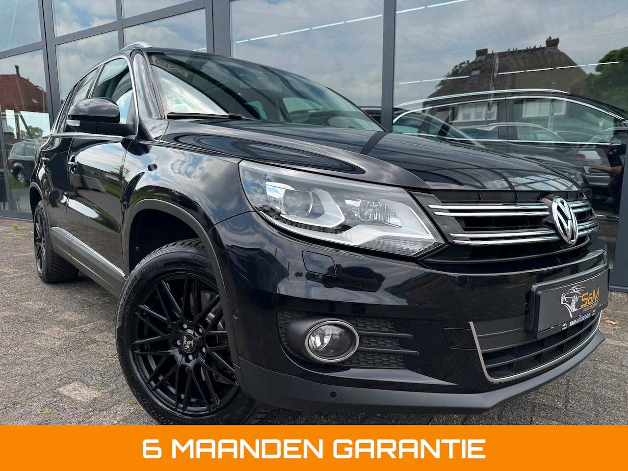 Volkswagen Tiguan - 2.0 TSI Sport&Style 4Motion CarPlay - AutoWereld.nl