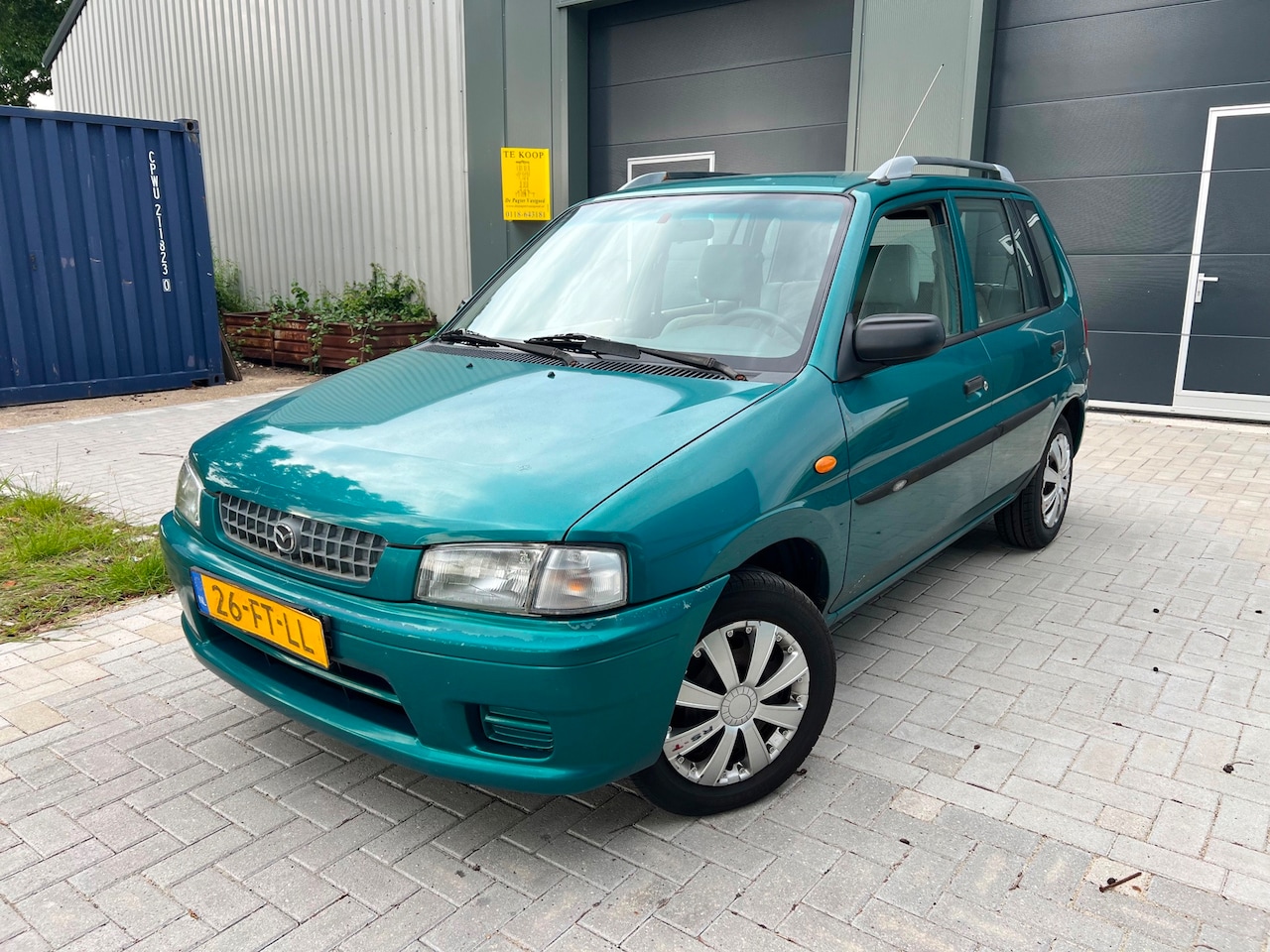 Mazda Demio - 1.3LX 136.466KM 1e Eigenaar - AutoWereld.nl