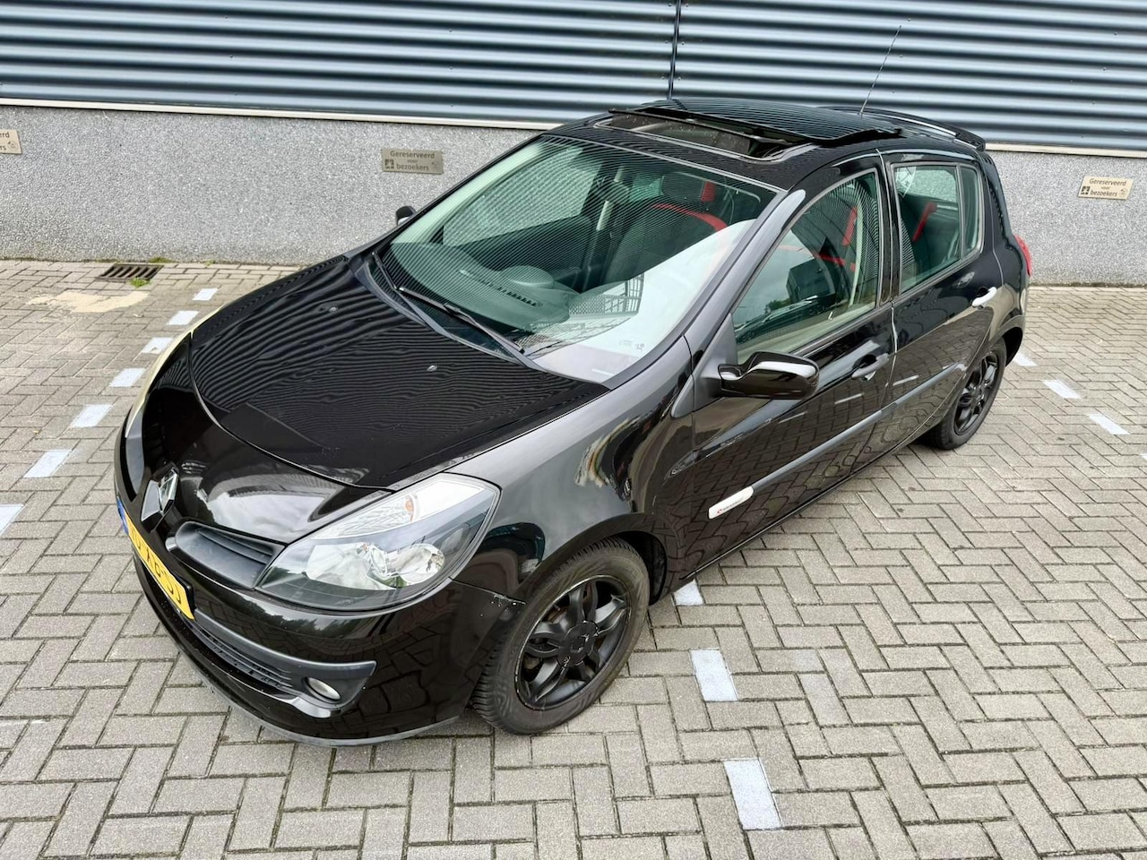 Renault Clio - 1.4-16V Rip Curl *PANORAMADAK*AIRCO*100PK - AutoWereld.nl
