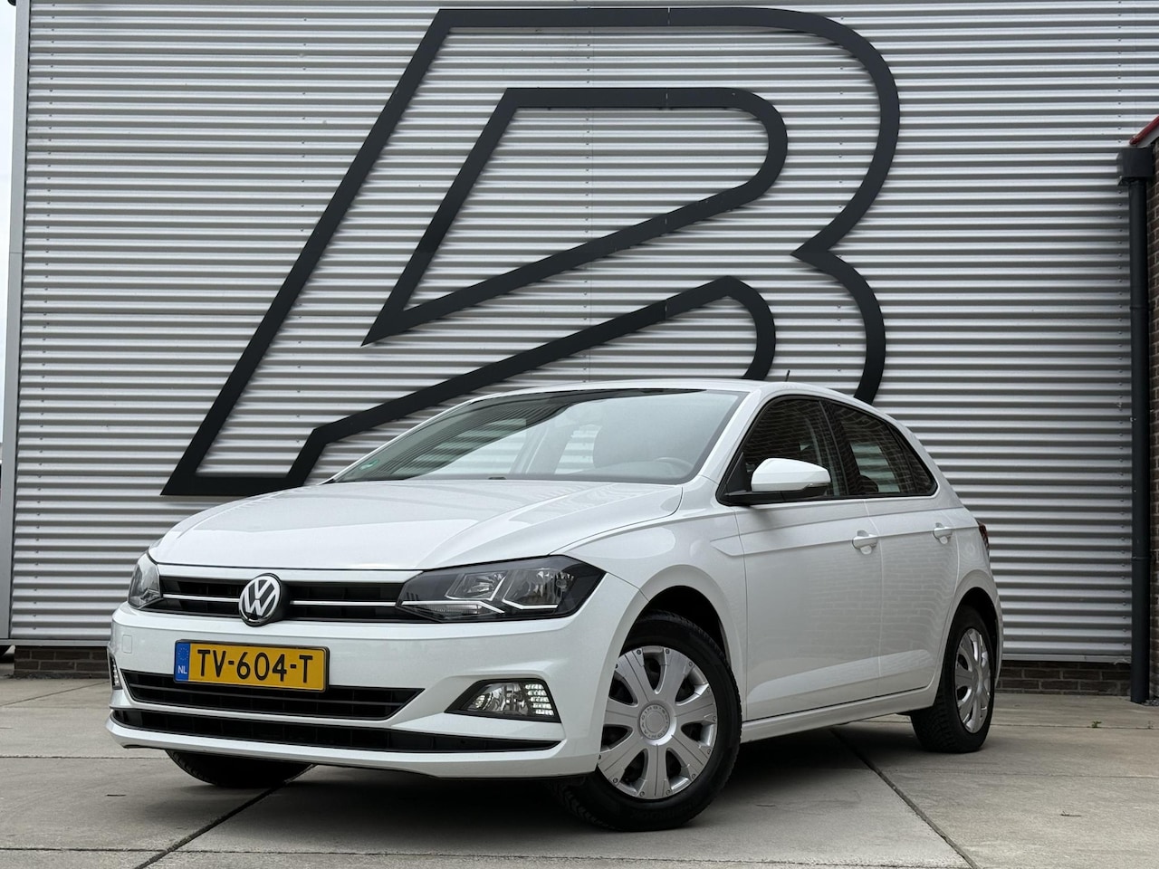 Volkswagen Polo - 1.0 TSI Comfortline 2e Eigenaar|Navi|Carplay|Trekhaak|Cruise|Airco|N.A.P|APK tot 03-2027 - AutoWereld.nl