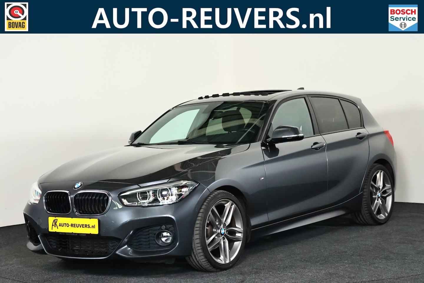 BMW 1-serie - 118i M-Sport High Executive / Panorama / Camera / Navigatie / LED - AutoWereld.nl