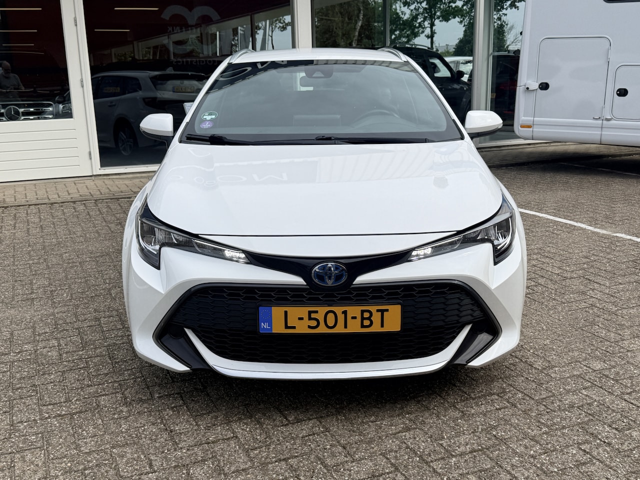 Toyota Corolla Touring Sports - 1.8 Hybrid Business | Trekhaak | LED | Adapt. Cruise | Camera | Apple/Android | Navi - AutoWereld.nl