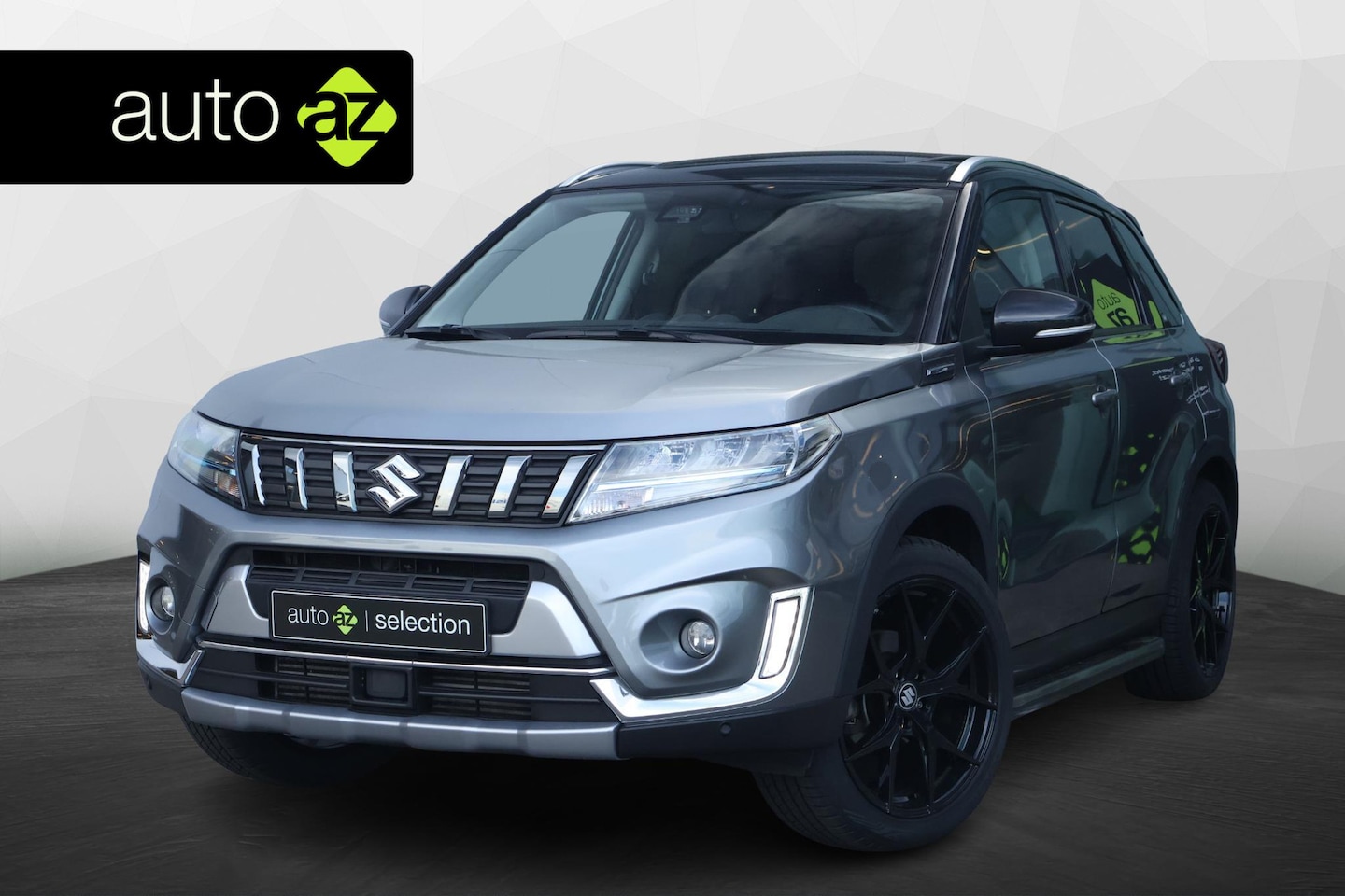 Suzuki Vitara - 1.4 Boosterjet Style Smart Hybrid / Panorama / Trekhaak - AutoWereld.nl