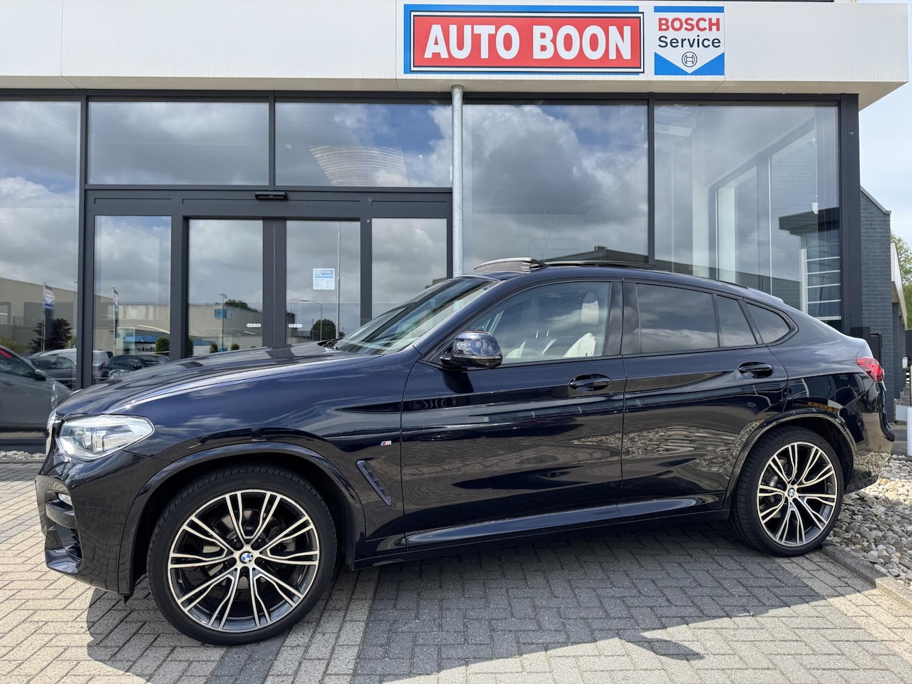 BMW X4 - XDRIVE20I M-SPORT HIGH EXECUTIVE PANO/NAVI/21''/ MEMORY/FULL LED/VOLLEER/HUD/P-CAM360/2XKE - AutoWereld.nl
