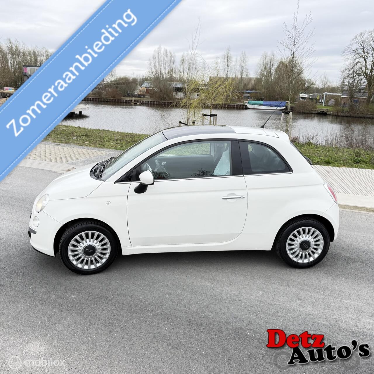 Fiat 500 - 1.2 Lounge airco,panorama dak,4 cilinder - AutoWereld.nl