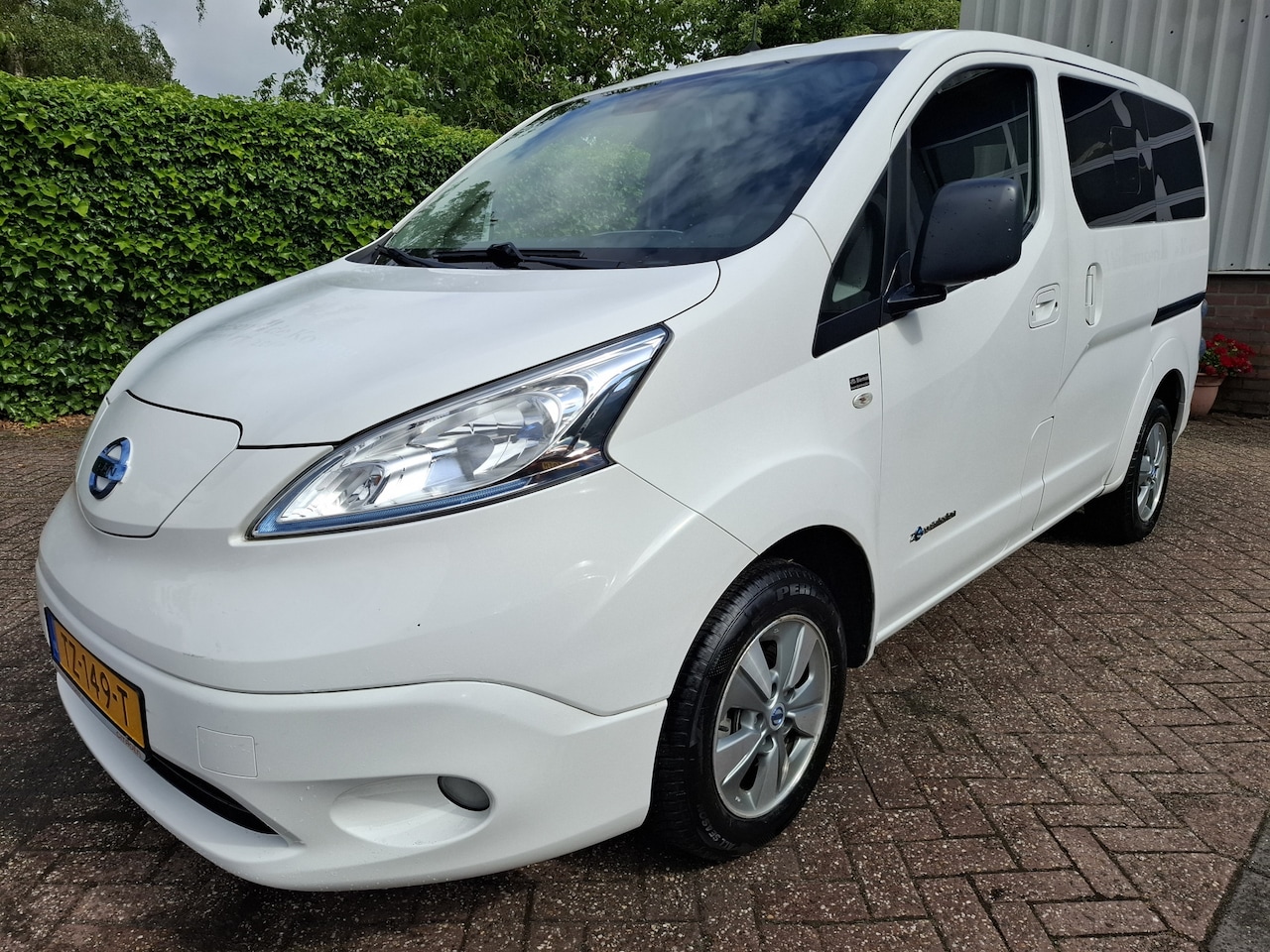 Nissan e-NV200 Evalia - 40 kWh 10950.- EX BTW ROLSTOELVERVOER 7-PERSOONS 110PK - AutoWereld.nl