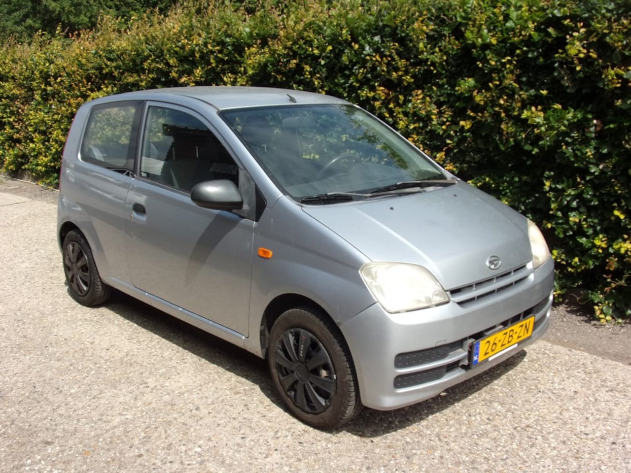 Daihatsu Cuore - 1.0-12V 100th Anniversary NWE APK - AutoWereld.nl