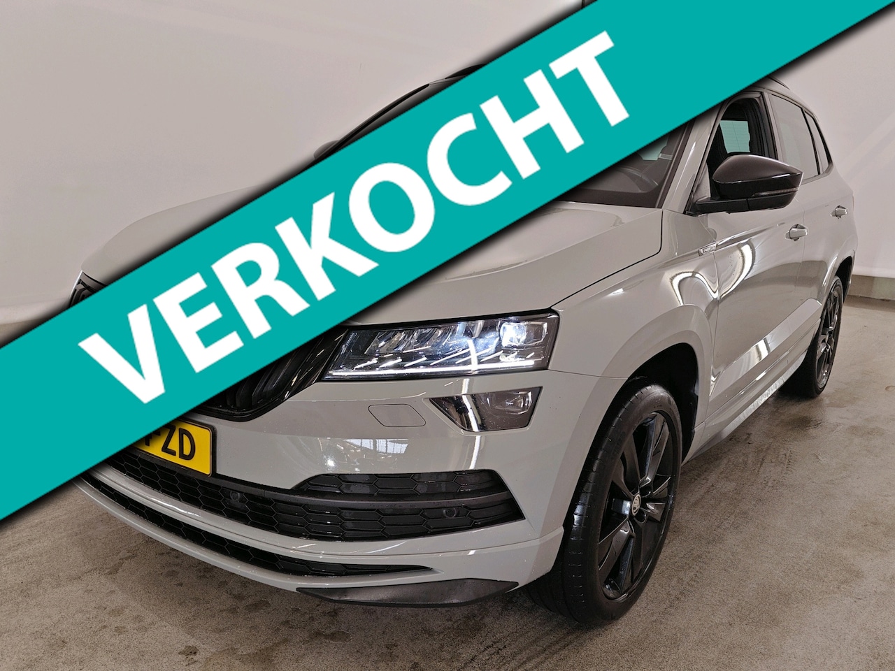 Skoda Karoq - 1.5 TSI 150pk ACT Sportline Business | Panoramadak | Trekhaak | Stoelverwarming | CarPlay - AutoWereld.nl