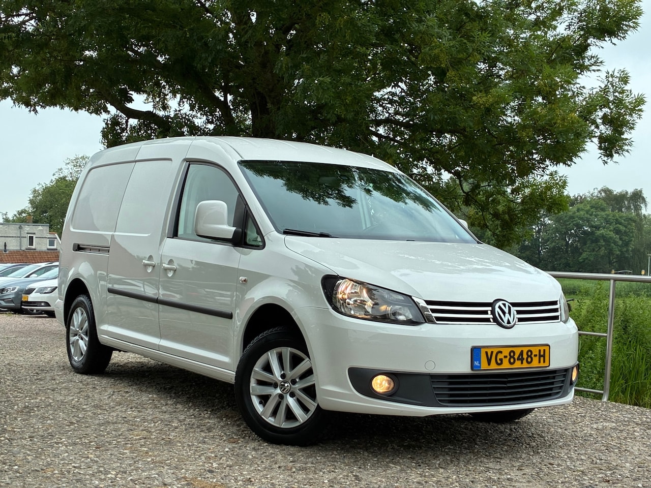 Volkswagen Caddy Maxi - 1.6 TDI BMT | Half leder + Cruise + Airco + Navi nu € 3.975,- Marge!!! - AutoWereld.nl