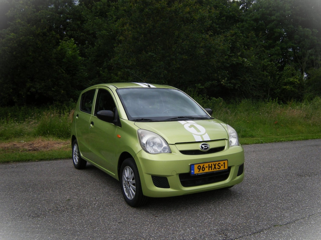 Daihatsu Cuore - 1.0 Trend . 5 Deurs . Lichtmetalen velgen . Centrale deurvergrendeling . Audio . enz - AutoWereld.nl