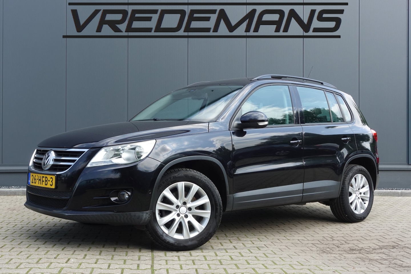 Volkswagen Tiguan - 1.4 TSI Comfort&Design 4Motion PANO/NAVI/CAMERA - AutoWereld.nl