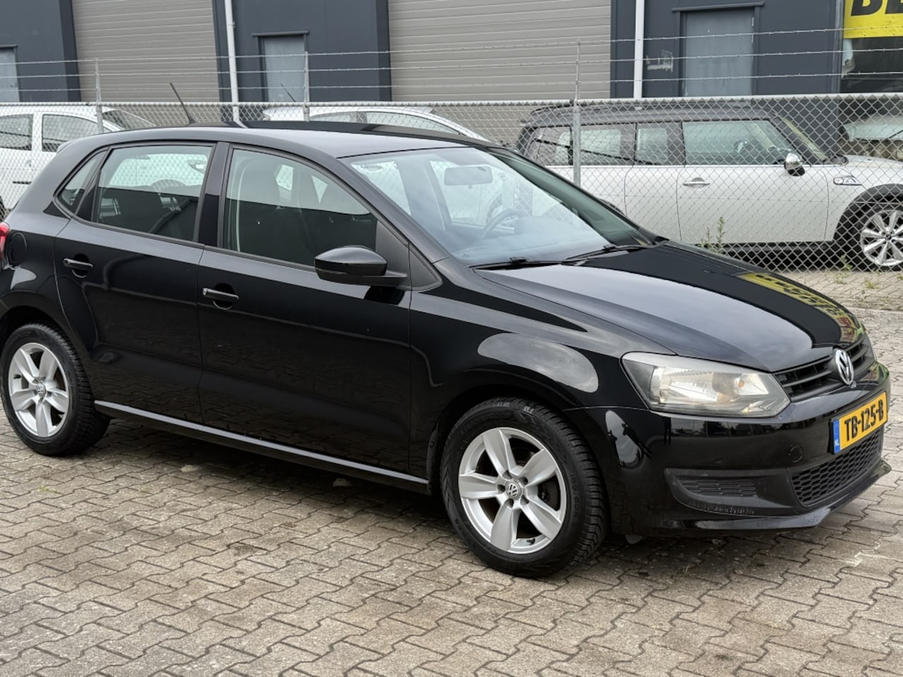 Volkswagen Polo - 1.2 AIRCO NAVI SPORTVELGEN 5-DEURS - AutoWereld.nl