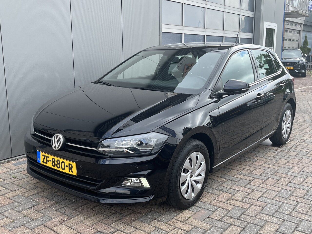 Volkswagen Polo - 1.0 TSI Comfortline / PARKEER SENSOREN V+A/ CRUISE/ AIRCO/ NAVI/ DAB - AutoWereld.nl