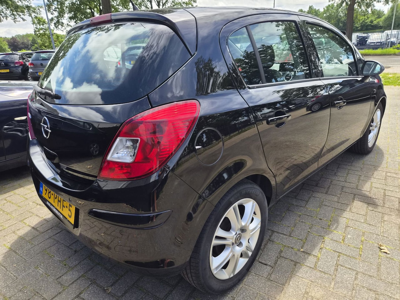 Opel Corsa - 1.4-16V Cosmo apple car play airco cruise control perfect ond. - AutoWereld.nl