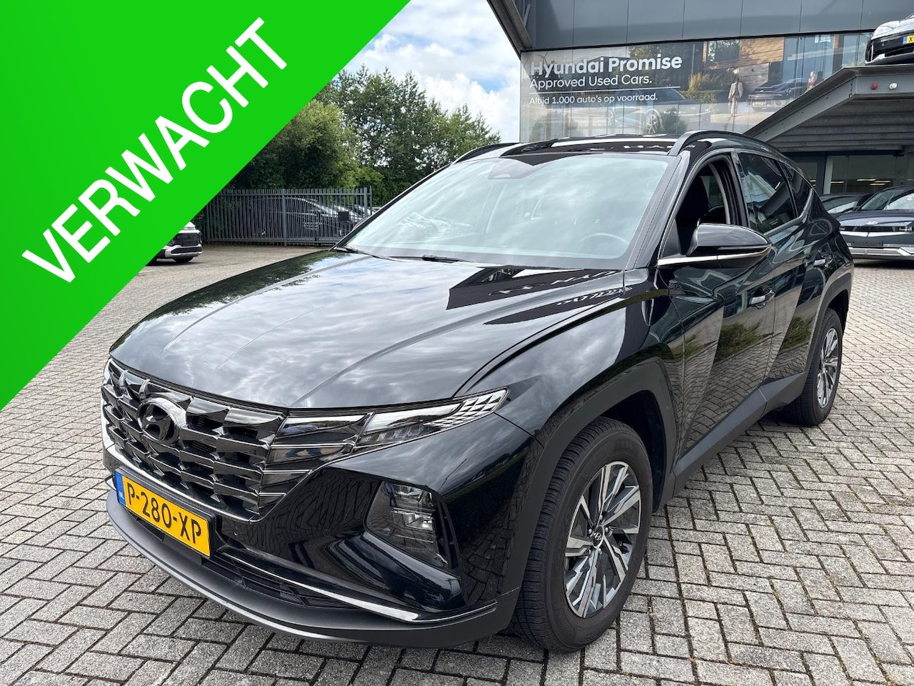 Hyundai Tucson - 1.6 T-GDI HEV Comfort Smart | All Season Banden | Navigatie | Stoelverwarming | Adaptive C - AutoWereld.nl
