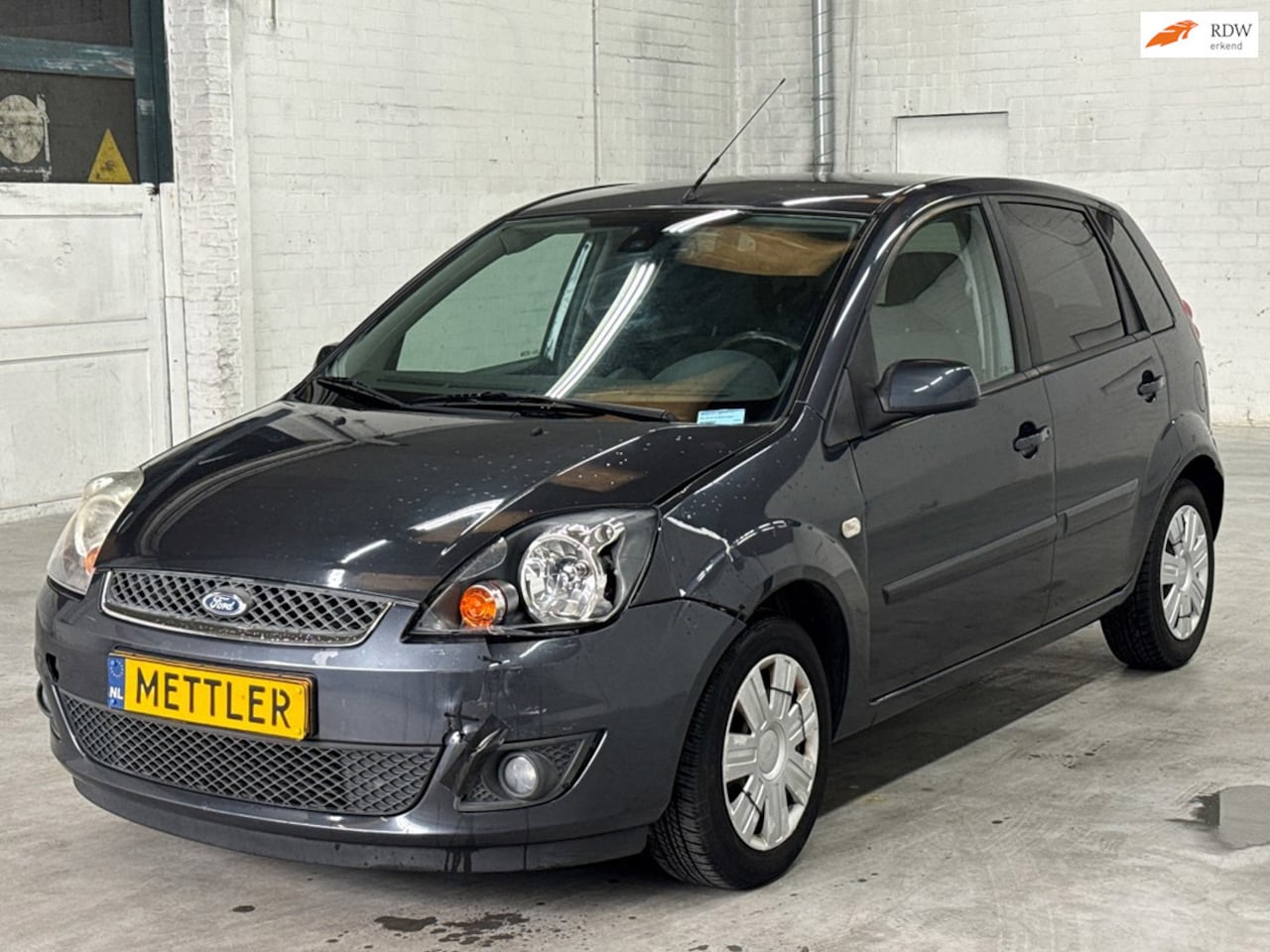 Ford Fiesta - 1.3-8V Cool & Sound | Airco - AutoWereld.nl