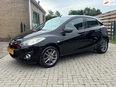 Mazda 2 - 2 1.3 BIFUEL Navigator GT | airco | cruise | trekhaak | 5drs | navi | stoel verwarming