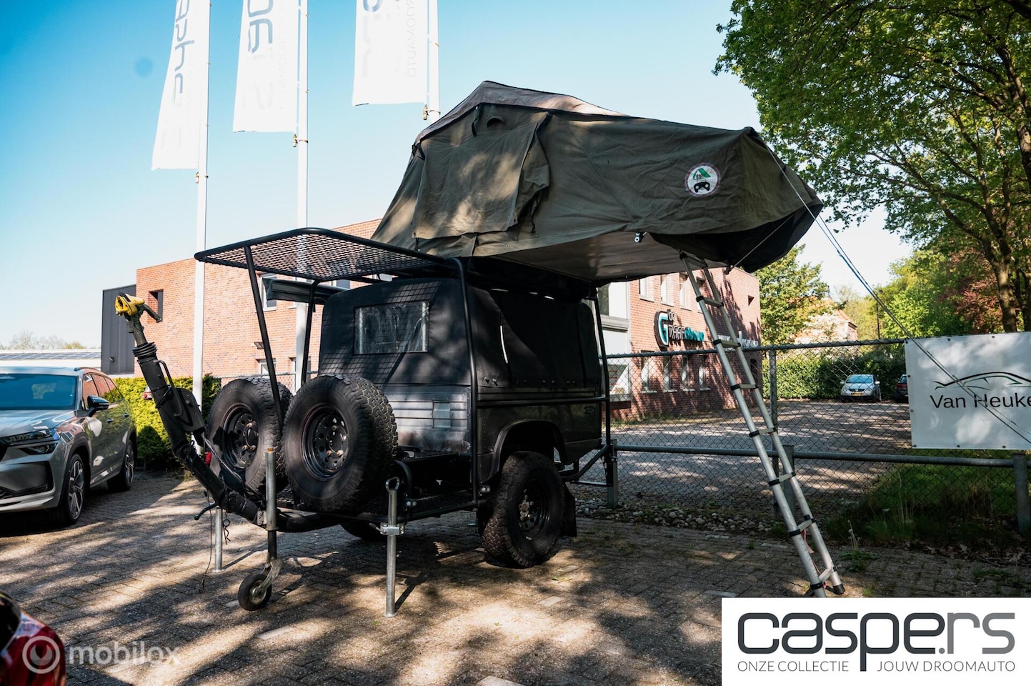 Land Rover Defender - Camper Aanhangwagen- vakantie - AutoWereld.nl