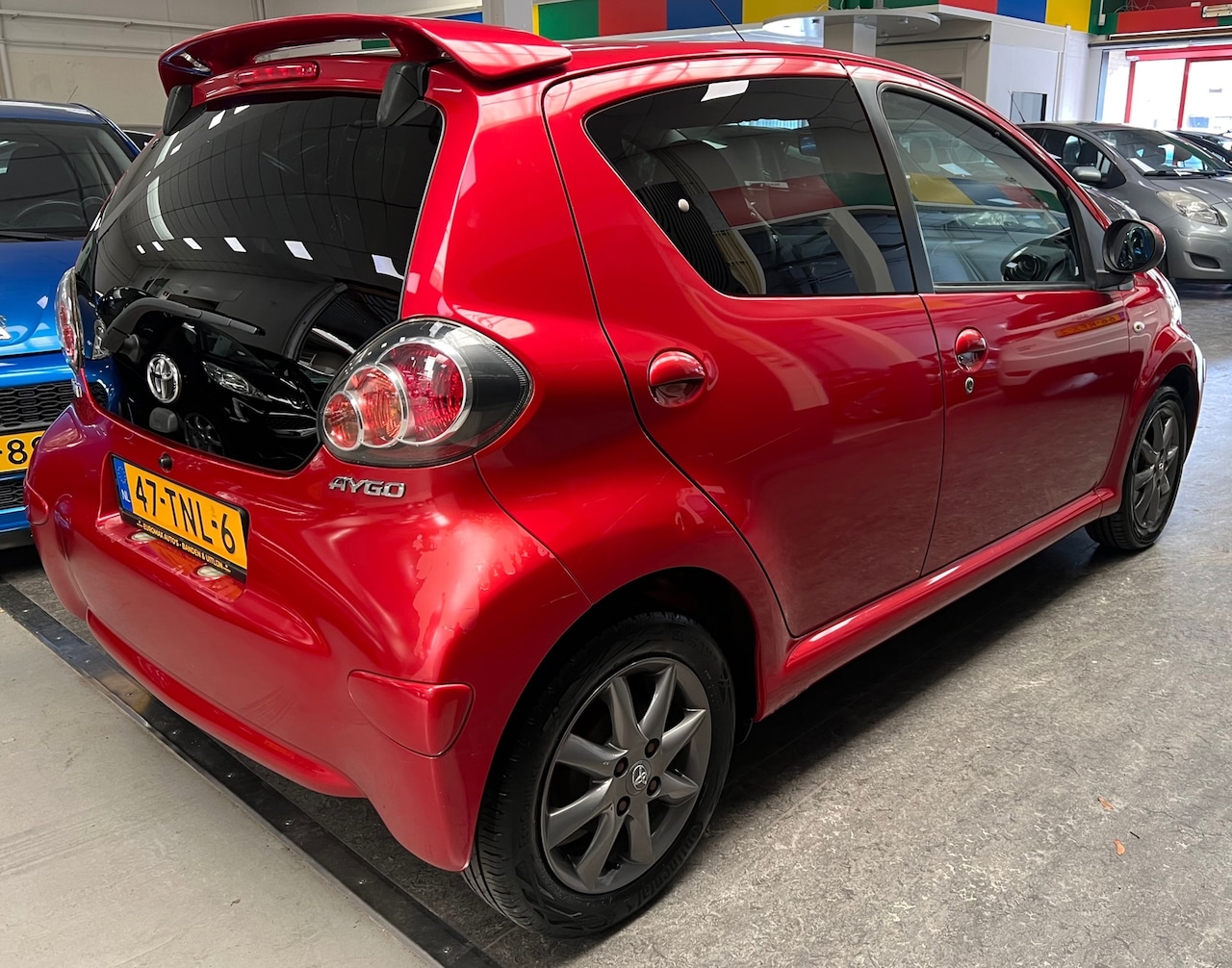 Toyota Aygo - 1.0-12V Dynamic Navigator - 1e Eigenaar - NAP - NAV - Airco. - AutoWereld.nl