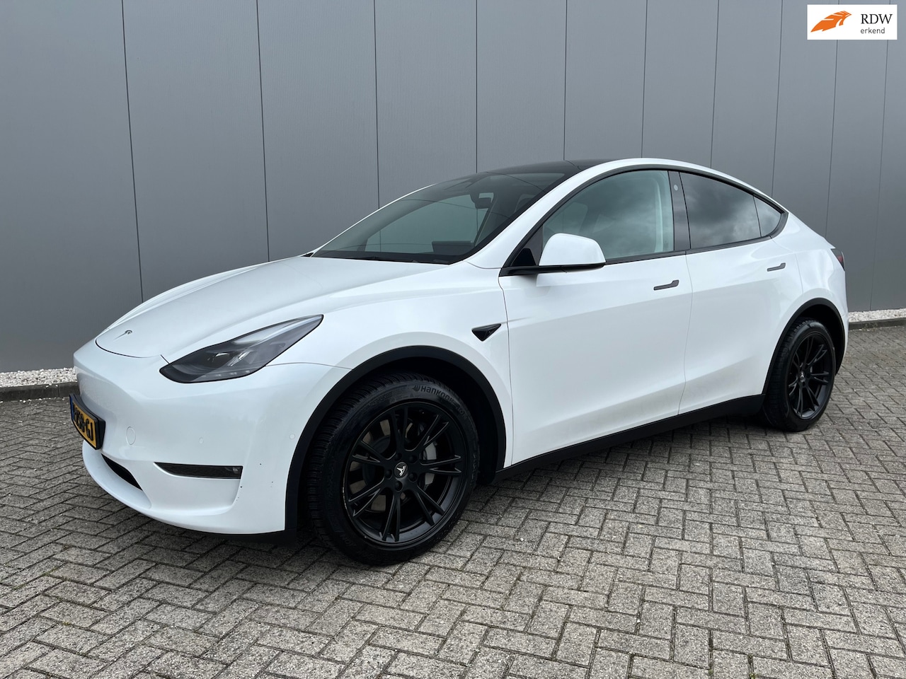 Tesla Model Y - Long Range AWD 75 kWh/ SOH 91.9 %/ 27190 ex - AutoWereld.nl