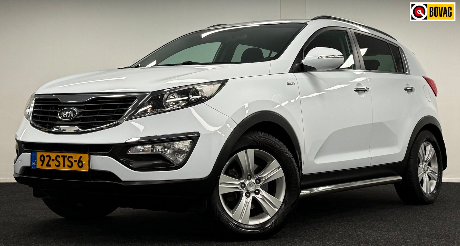 Kia Sportage - 2.0 X-ecutive 4wd Plus Pack*NAP*PerfectOh*Automaat*Navi*1/2Leder*Cruise - AutoWereld.nl