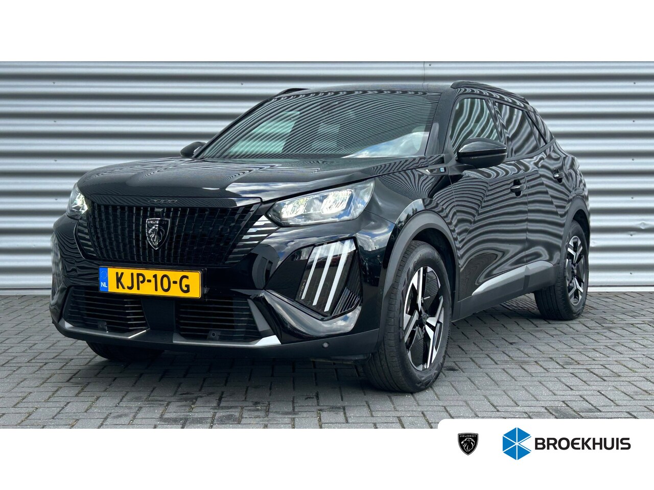 Peugeot e-2008 - 54KWH 156PK ALLURE AVANTAGE AUTOMAAT / NAVI / LEDER / CLIMA / LED / PDC / 17" LMV / KEYLES - AutoWereld.nl