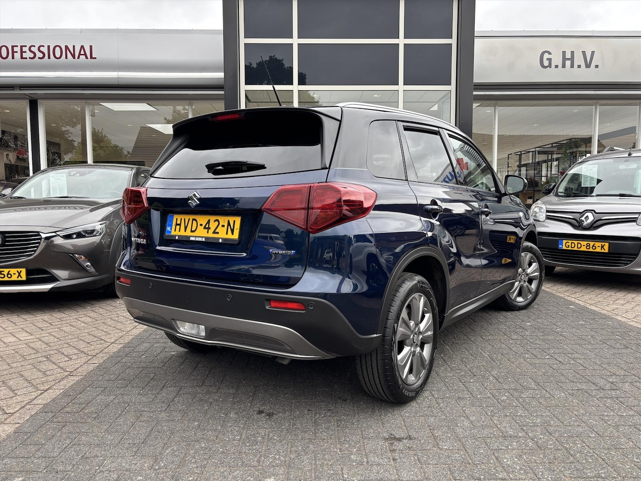 Suzuki Vitara - 1.5 Hybrid 115pk Select Automaat | Two-tone | - AutoWereld.nl