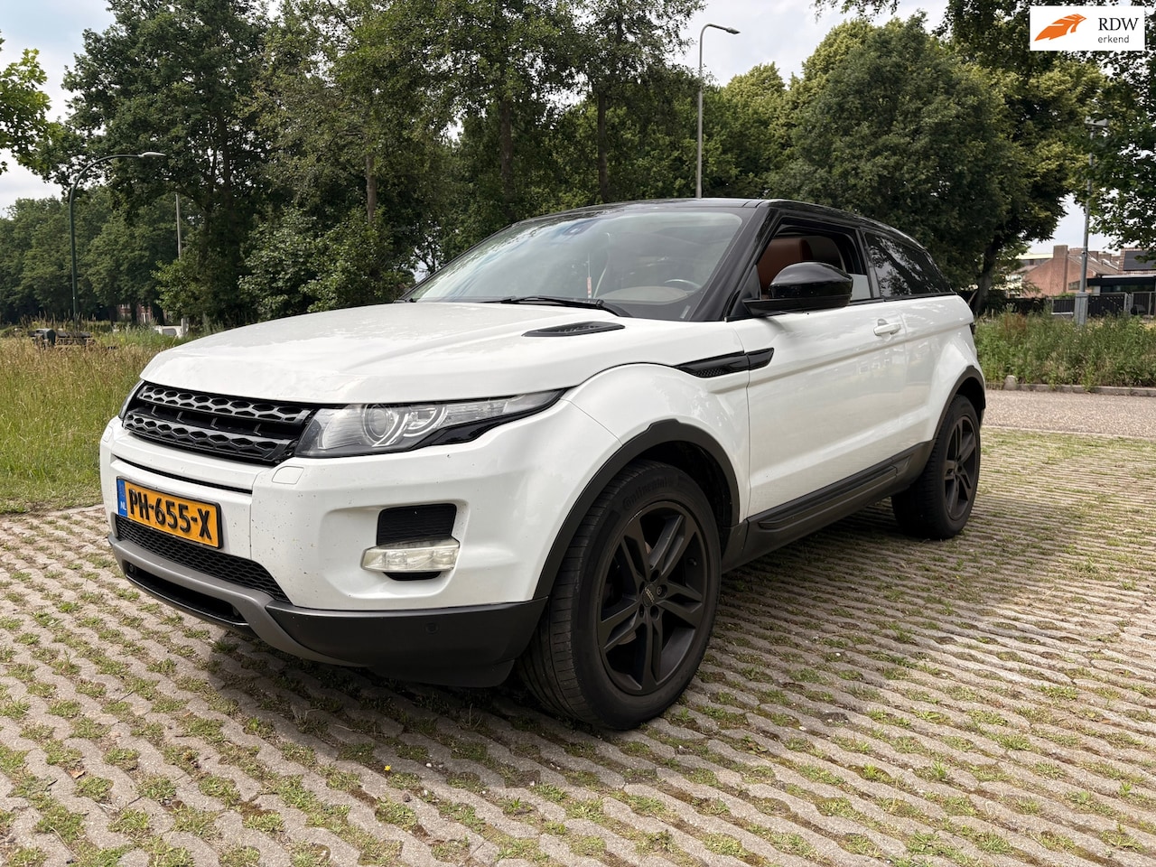 Land Rover Range Rover Evoque Coupé - 2.2 SD4 4WD Prestige - panorama dak - automaat - leder - AutoWereld.nl