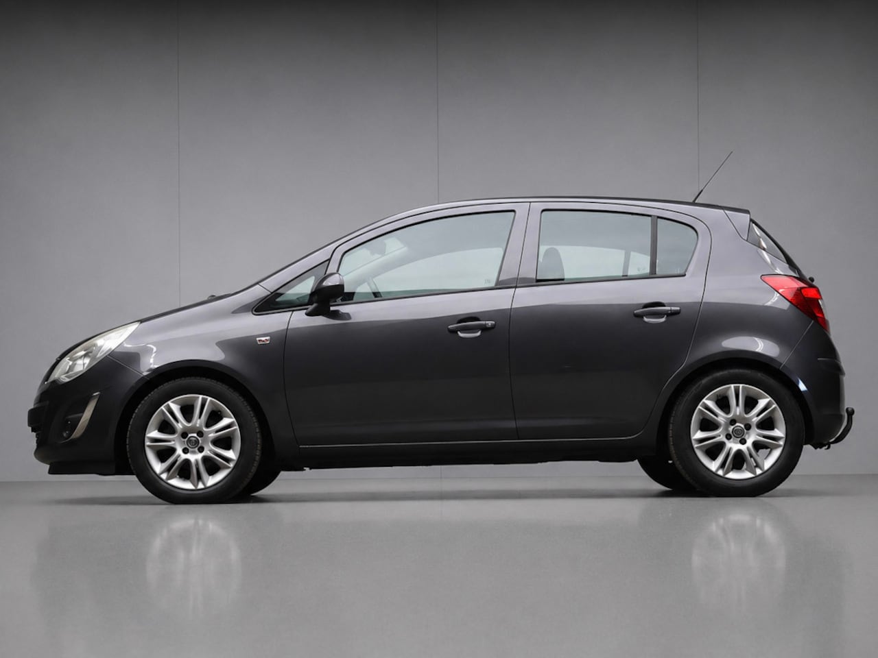 Opel Corsa - 1.4-16V Edition Sport (AIRCO,NIEUWE APK,LED,SPORTSTOELEN,NAVI,TREKHAAK,LM VELGEN,NETTESTAA - AutoWereld.nl