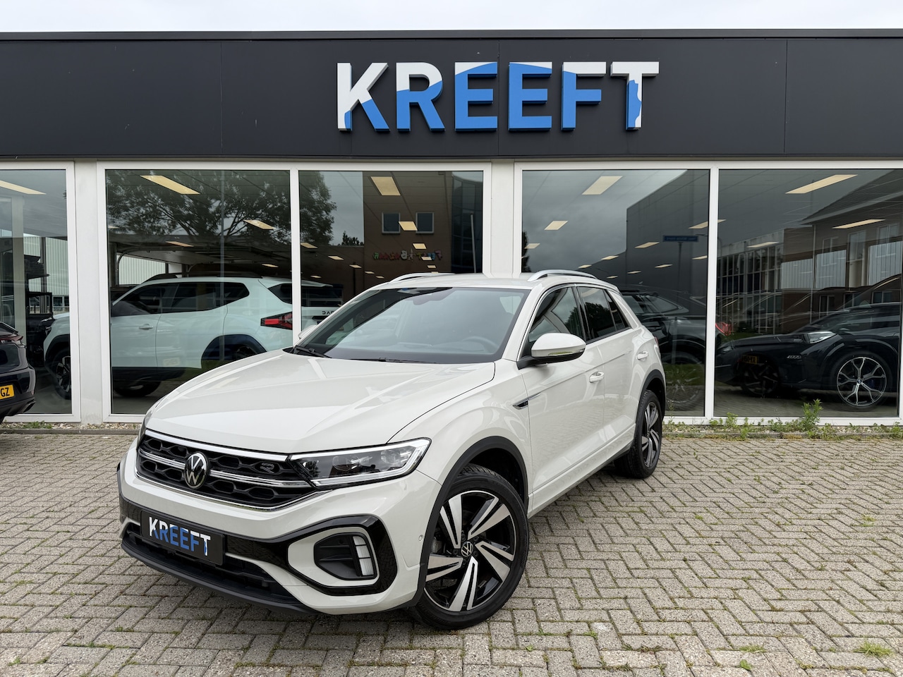 Volkswagen T-Roc - 1.5 TSI R-Line Ascotgrau - AutoWereld.nl