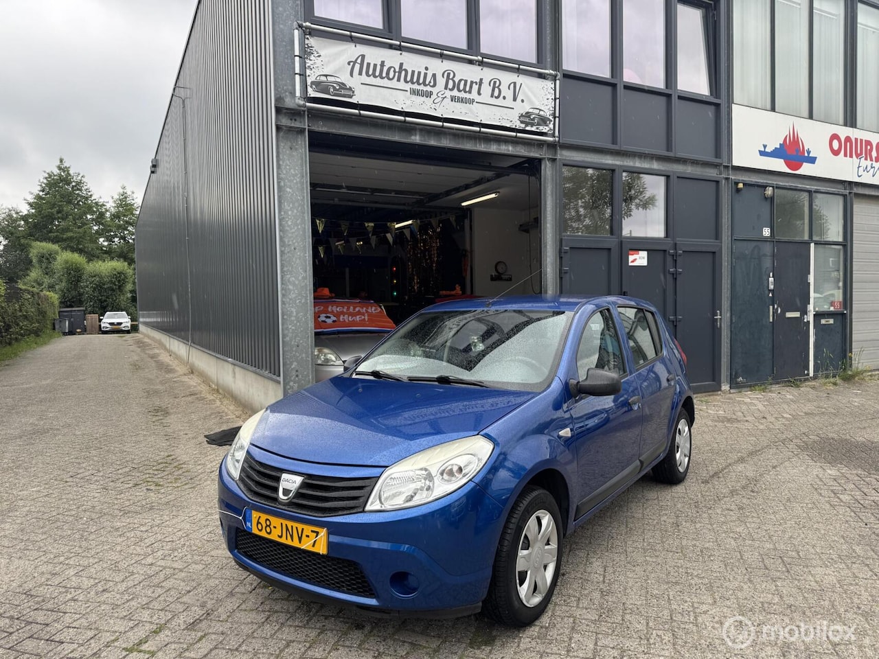 Dacia Sandero - 1.2 Airco! 101.485 km NAP Logisch! Nieuw APK! - AutoWereld.nl