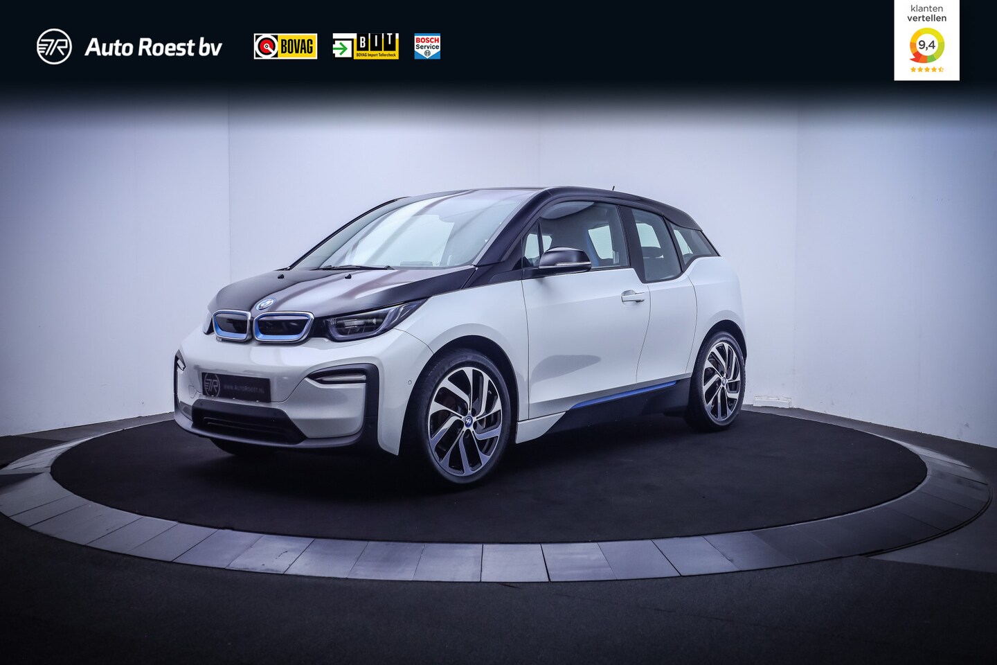 BMW i3 - 120Ah 42 kWh BUSINESS Plus FULL LED | WARMTEPOMP | CAMERA | NAVI | STOELVERW | PDC V+A | L - AutoWereld.nl