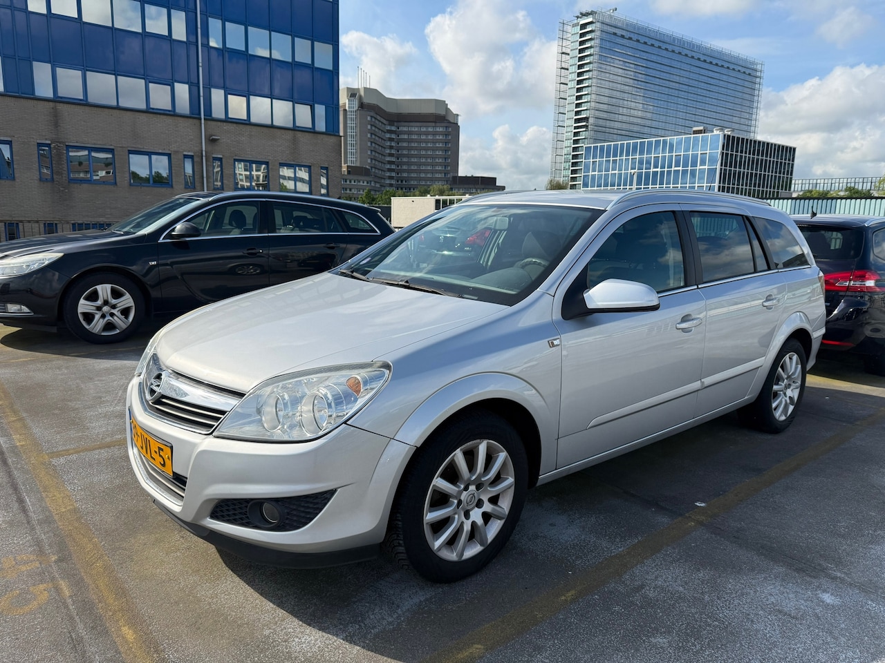Opel Astra Wagon - 1.6 Temptation Airco, Trekhaak, LMV - AutoWereld.nl
