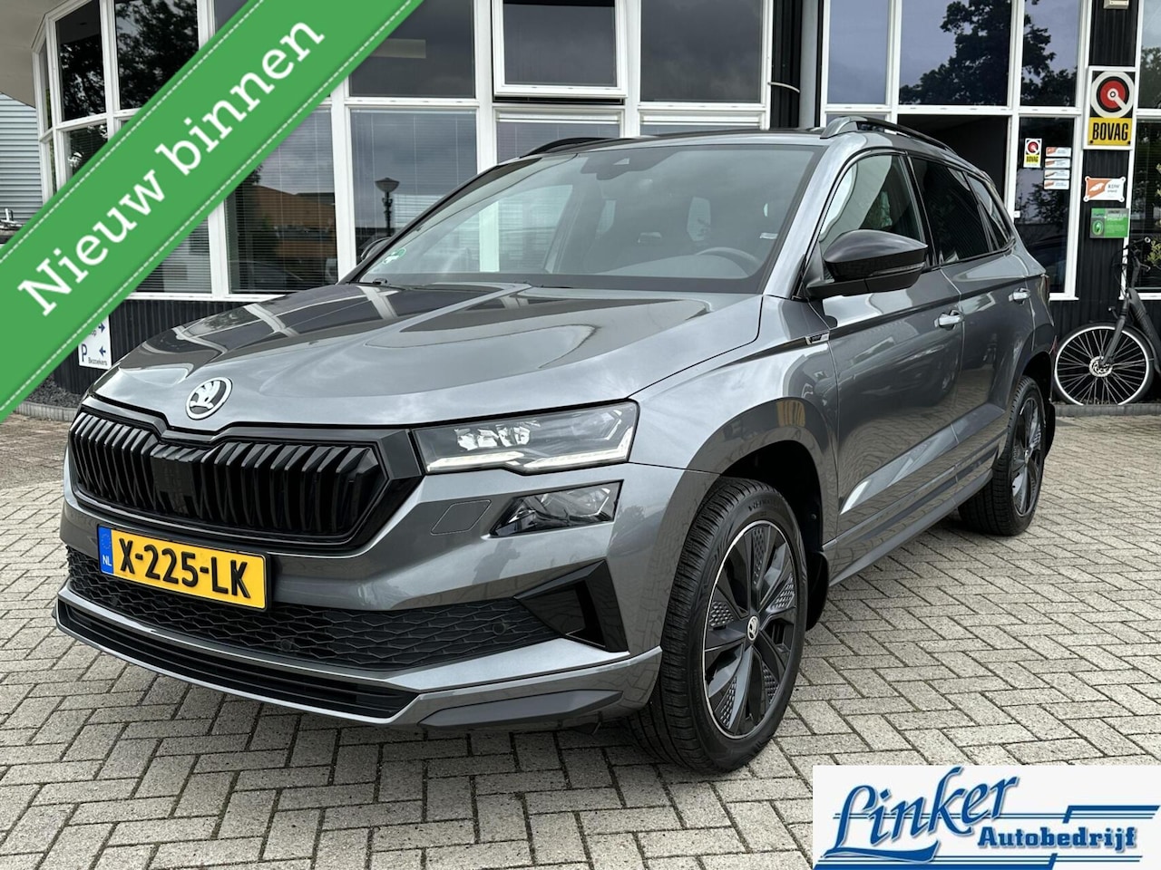 Skoda Karoq - 1.5 TSI ACT Sportline Business - NL-AUTO PANO TREKH - AutoWereld.nl