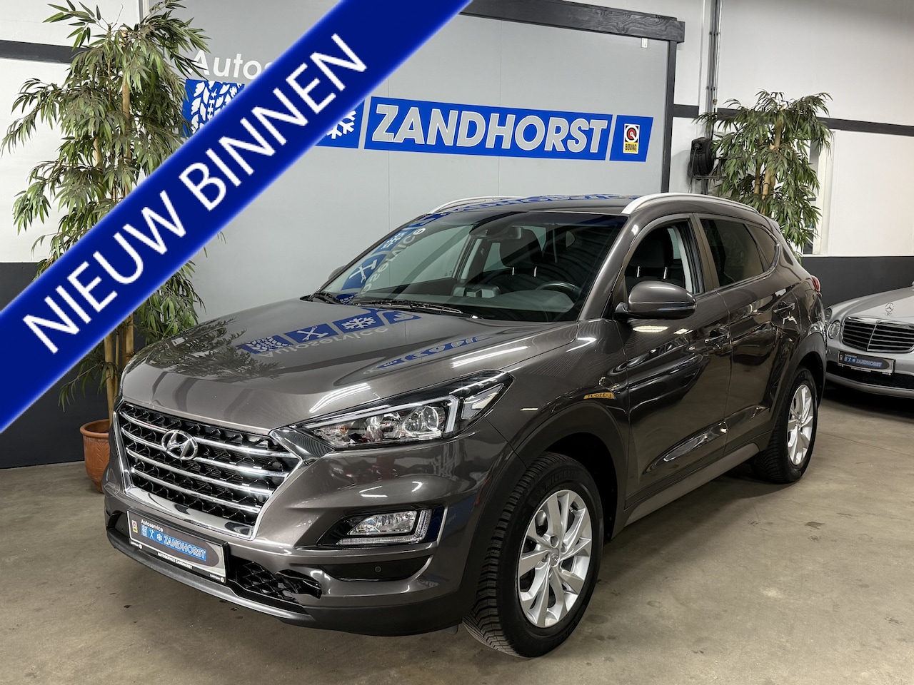 Hyundai Tucson - 1.6 GDI Comfort // 17 inch // Camera // Stoelverw. - AutoWereld.nl