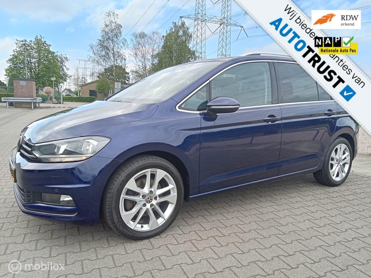 Volkswagen Touran - 1.5 TSI Comfortline Business 7P/Automaat/Navi - AutoWereld.nl