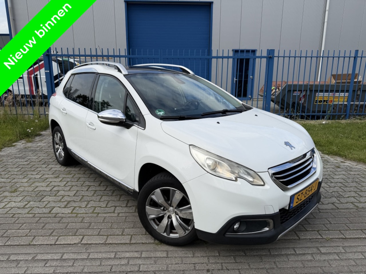 Peugeot 2008 - 1.6 HDi Allure Pano|Clima|Cruise|Navi|Sensoren - AutoWereld.nl