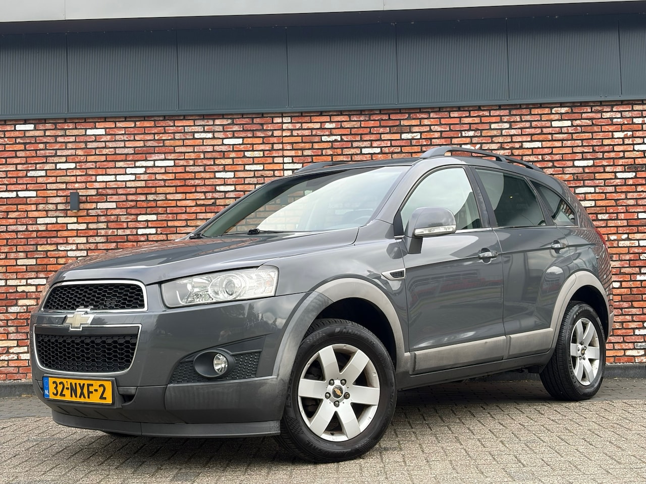 Chevrolet Captiva - 2.4i LT 2WD 7-Pers Trekhaak Nav/Cruise Clima Camera Voll.Onderhouden! - AutoWereld.nl