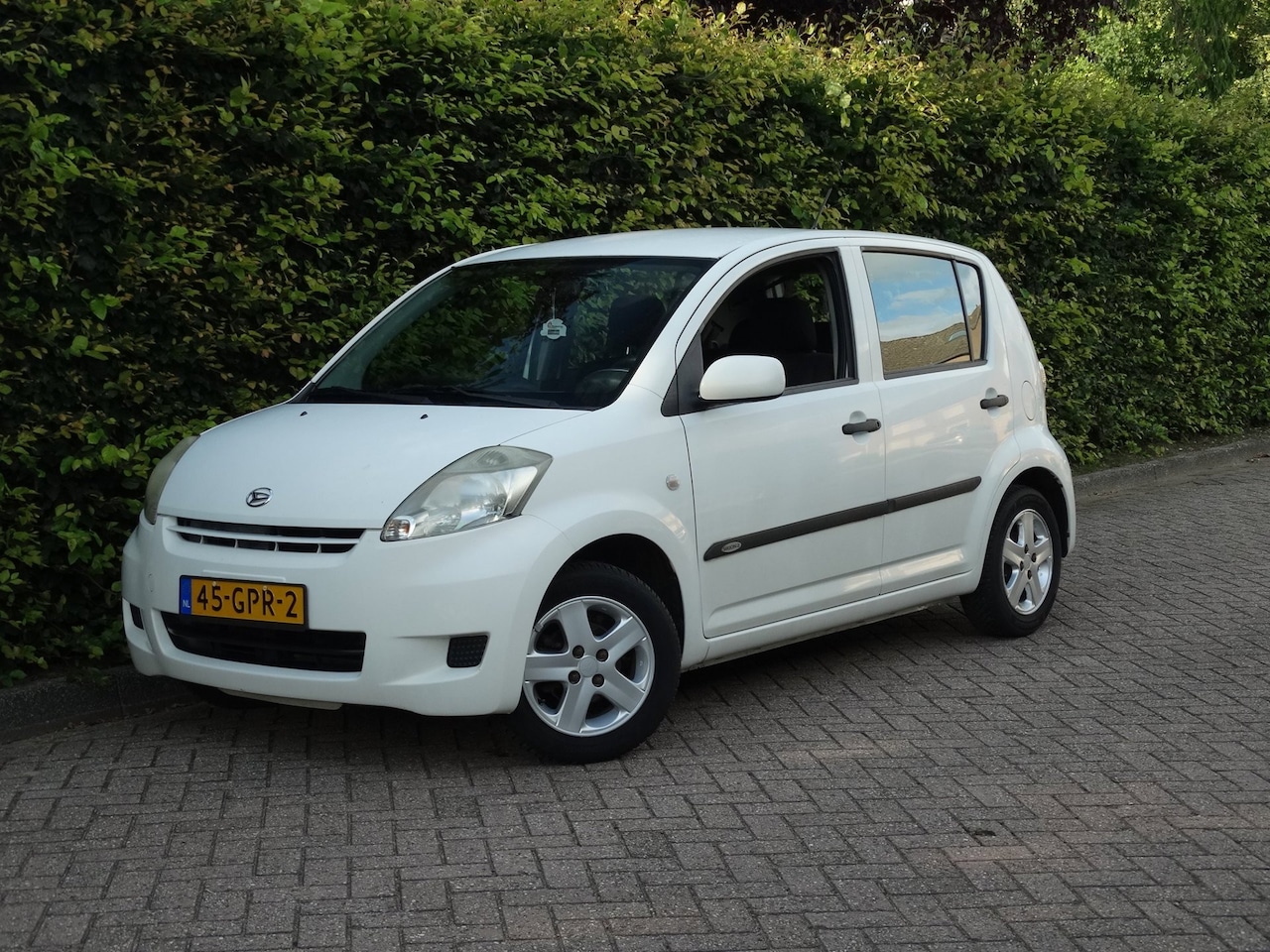 Daihatsu Sirion 2 - 1.0-12V Premium 5drs 14´´ Lm Vaste prijs - AutoWereld.nl