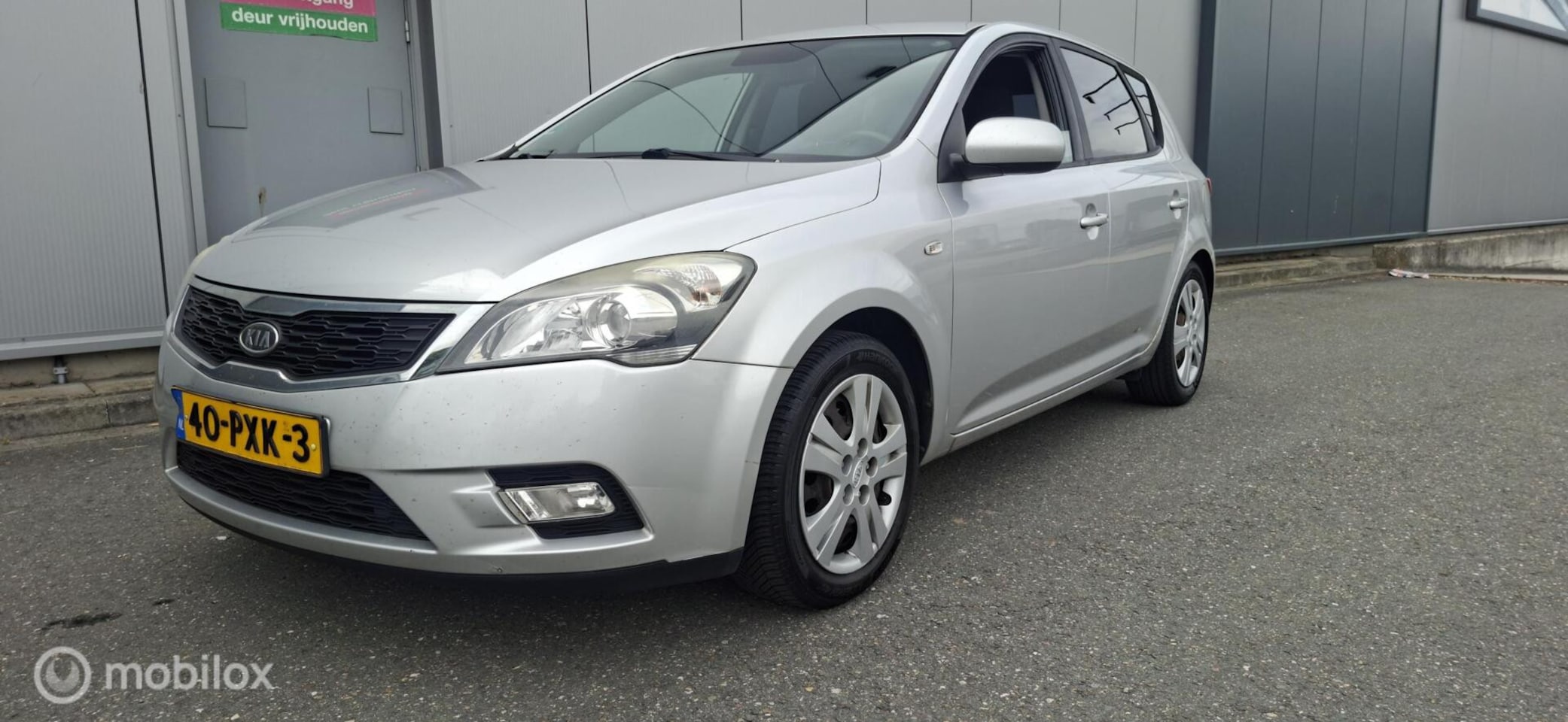 Kia Cee'd Sporty Wagon - 1.4 CVVT X-ecutive 1.4 CVVT X-ecutive - AutoWereld.nl