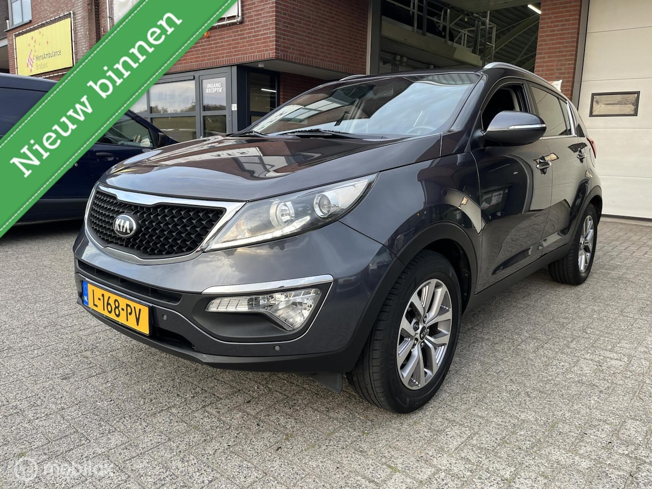 Kia Sportage - 1.6 GDI DynamicLine LEDER*CAMERA*TREKHAAK*PDC* - AutoWereld.nl
