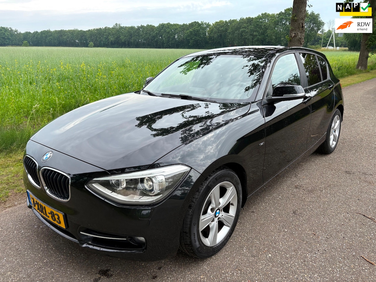 BMW 1-serie - 114i EDE Corporate Edition Sport/Zeer netjes/Boekjes/Airco/Xenon - AutoWereld.nl