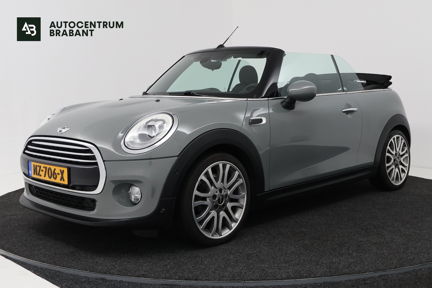 MINI Cabrio - 1.5 Cooper Pepper Serious Business (STOELVERWARMING, NAVIGATIE, CRUISE CONTROL, PARKEERSEN - AutoWereld.nl