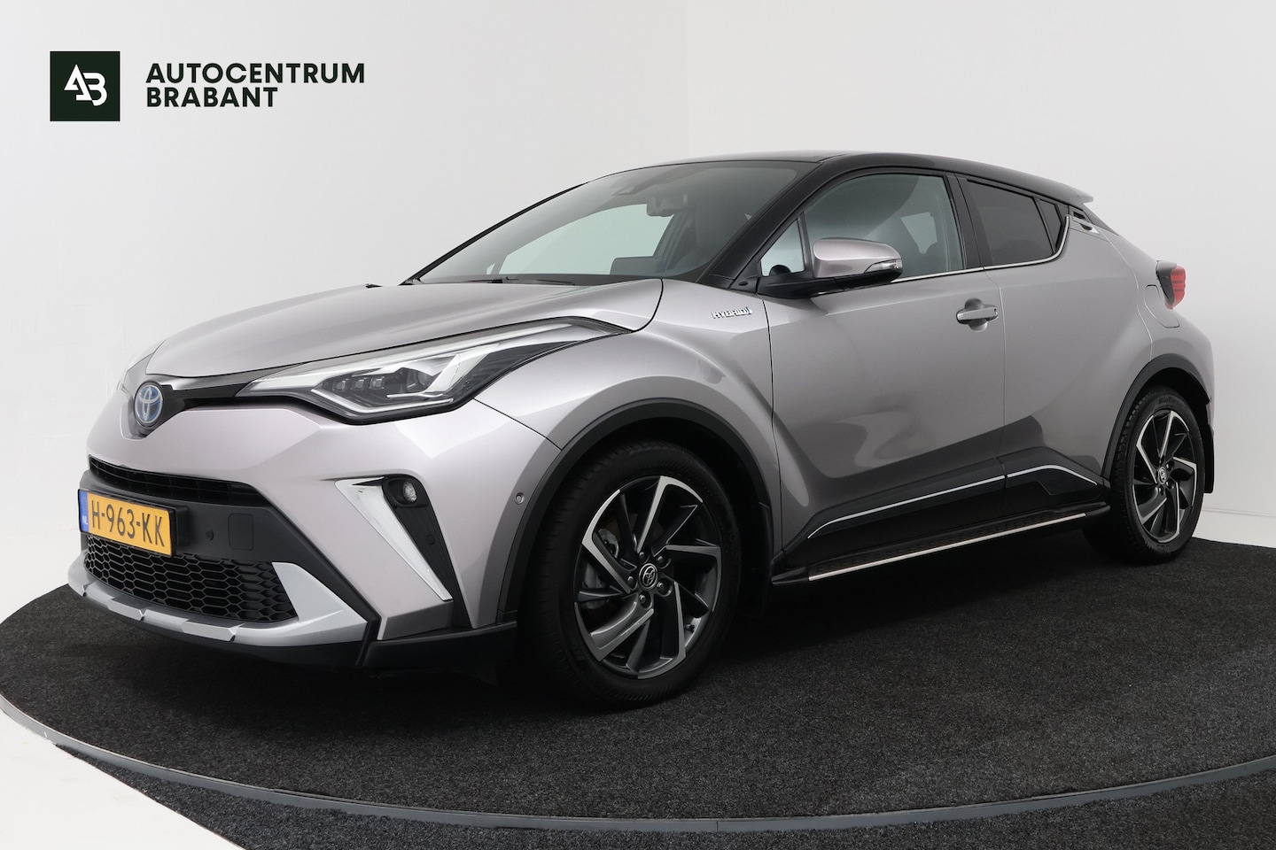 Toyota C-HR - 2.0 Hybrid Bi-Tone (SFEERVERLICHTING, STOELVERWARMING, ACHTERUITRIJCAMERA, PARKEERSENSOREN - AutoWereld.nl