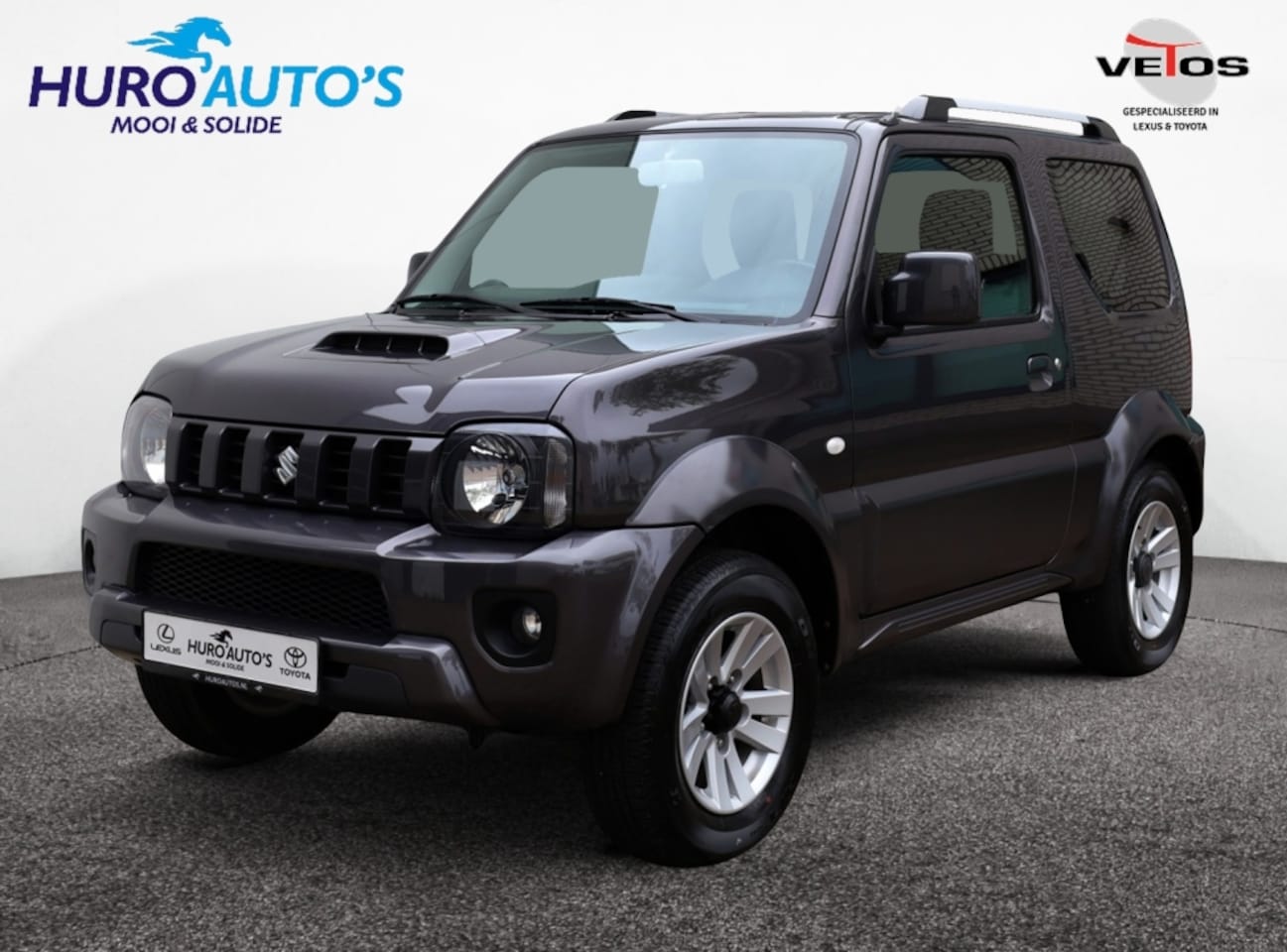 Suzuki Jimny - 1.3 Exclusive 4x4 AUTOMAAT | Leder | Airco | Trekhaak - AutoWereld.nl