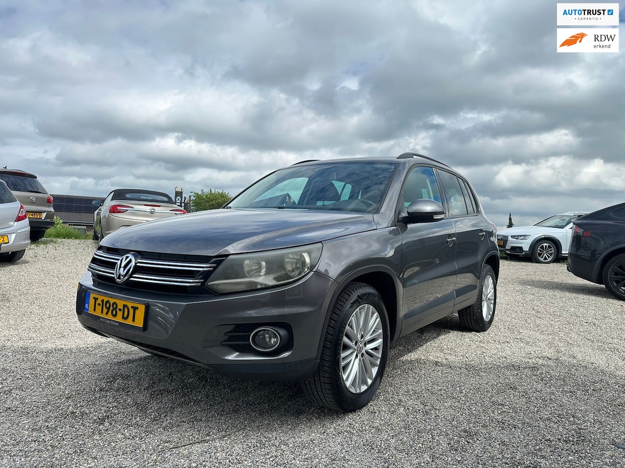 Volkswagen Tiguan - 2.0 TSI Sport&Style 4Motion 200PK|Automat|Pano|Cruise|NieuweAPK - AutoWereld.nl
