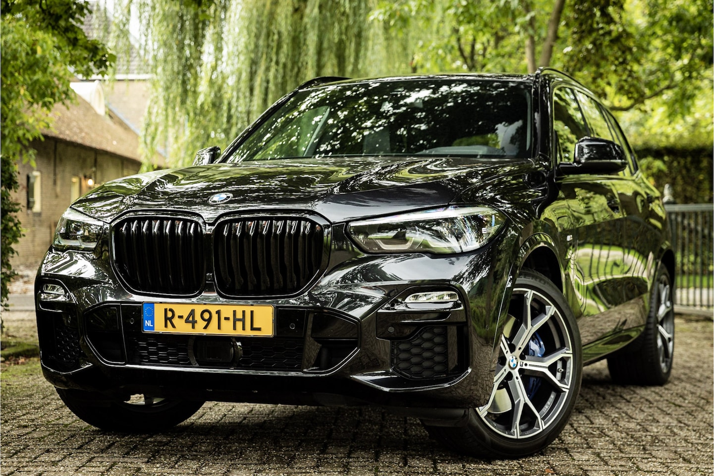 BMW X5 - xDrive45e M Sport Full Black 21" Comfort Access Trekhaak - AutoWereld.nl