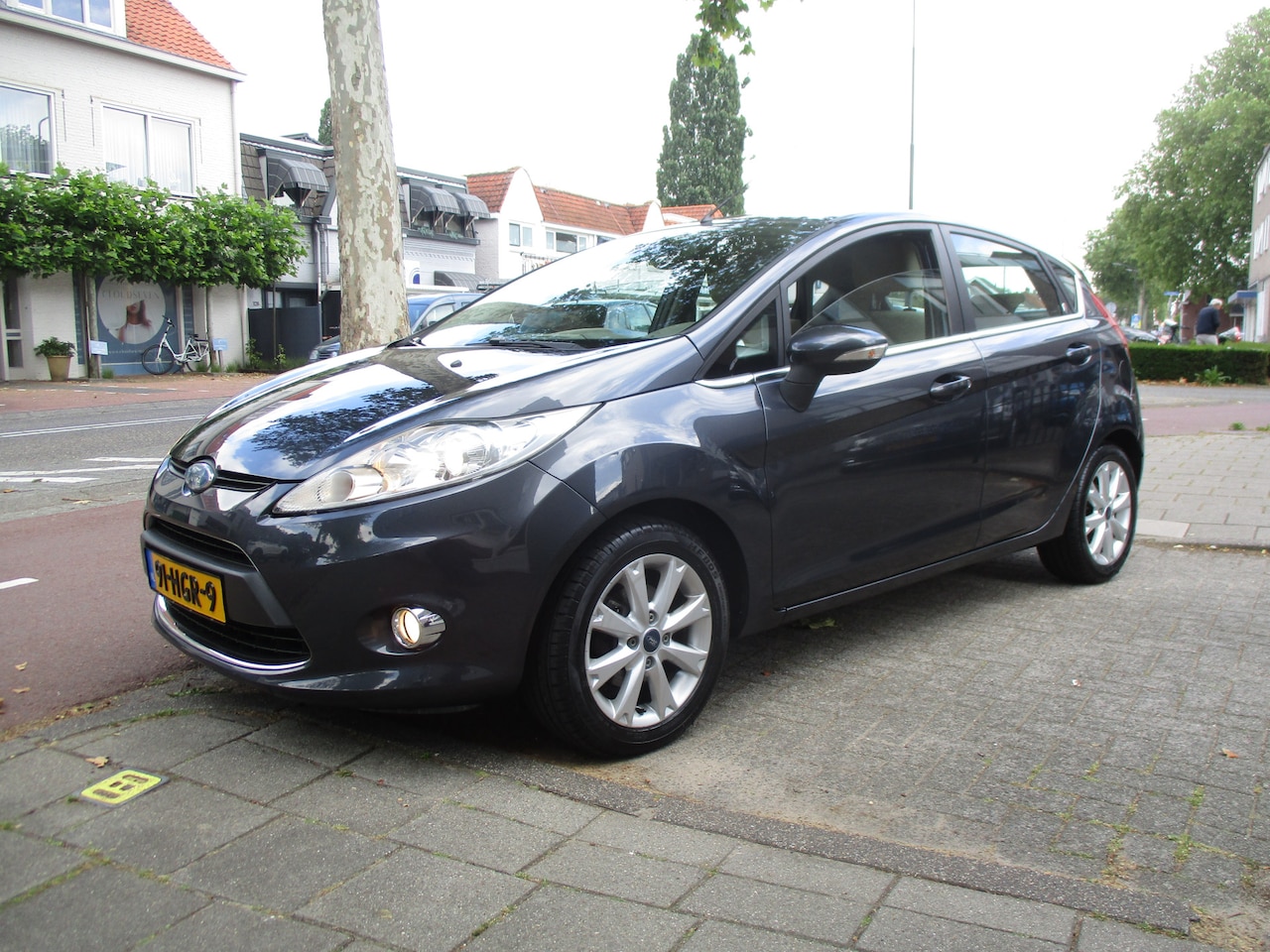 Ford Fiesta - 1.4 Ghia 5-drs / airco/ i.z.g.st / 204dkm - AutoWereld.nl