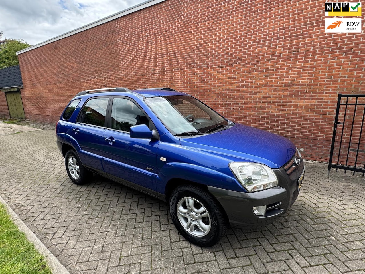 Kia Sportage - 2.7 V6 Adventure 4WD Navi Clima Cruise - AutoWereld.nl